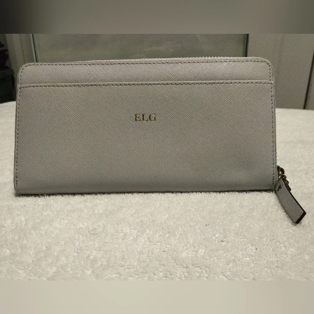 Kate Spade Zippy Liight Purple Wallet
